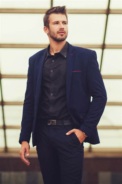 black shirt and navy blue suit
